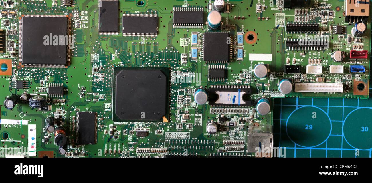 large microcircuits on a printed circuit board macro photography Stock Photo