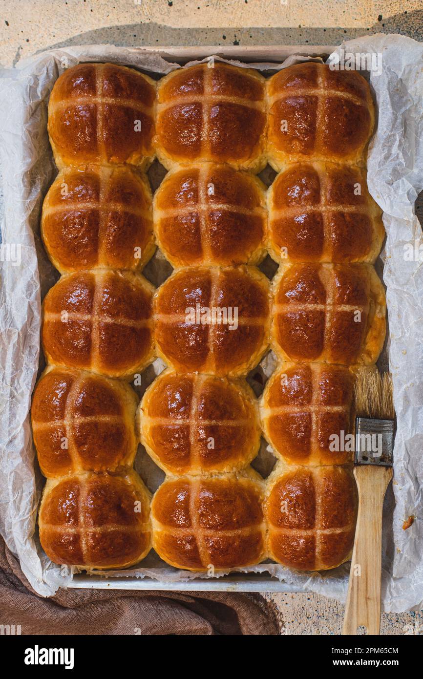 Hot cross buns in a baking tray Stock Photo