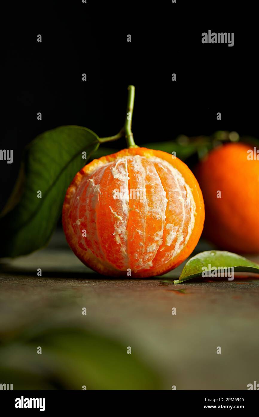 Macro Mandarin Orange on Dark Background Stock Photo