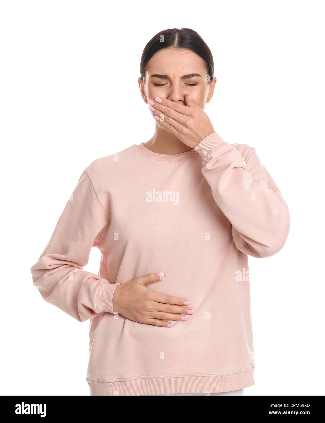 Woman suffering from stomach ache and nausea on white background. Food