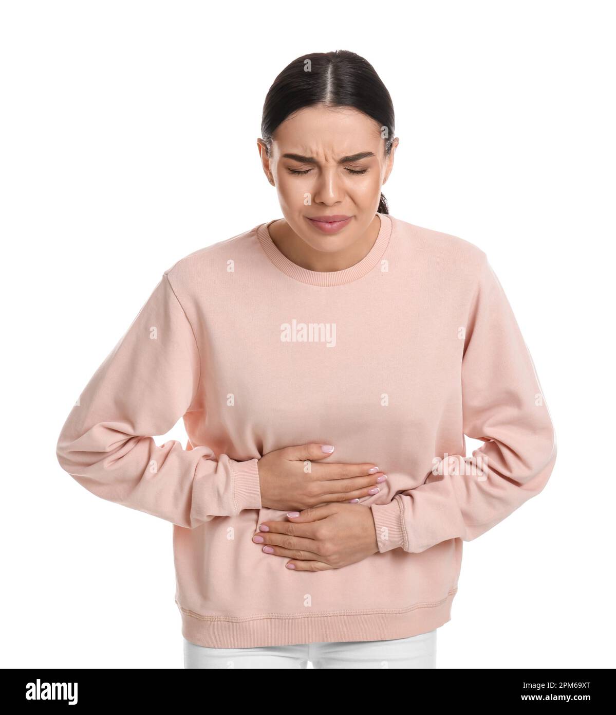 Woman suffering from stomach ache on white background. Food poisoning