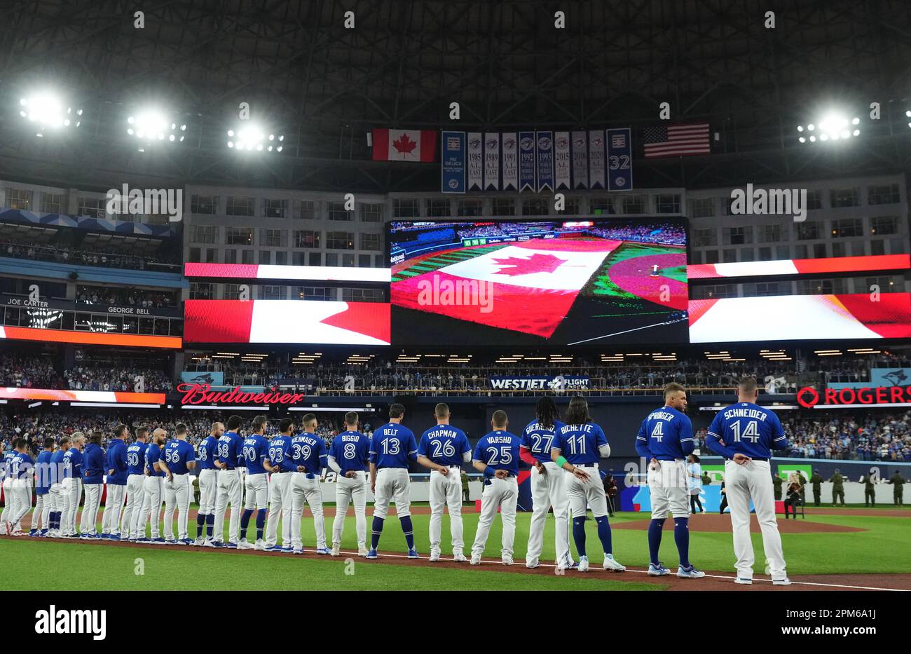 Toronto, Canada. 11th Apr, 2023. Toronto Blue Jays players stand for the  national anthem at the team's home opener MLB American League baseball  action against the Detroit Tigers in Toronto on Tuesday,