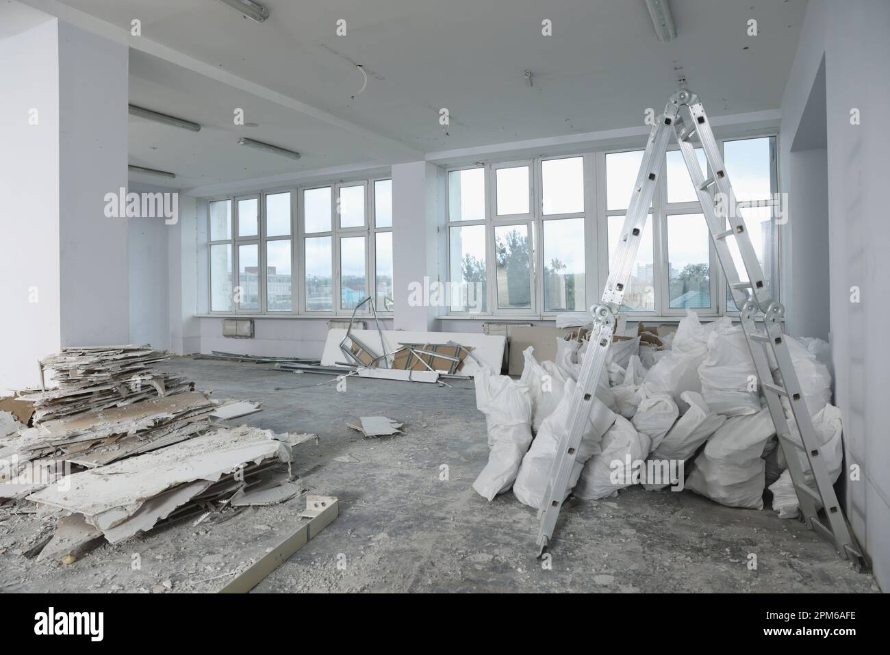 Used building materials in room prepared for renovation Stock Photo Alamy