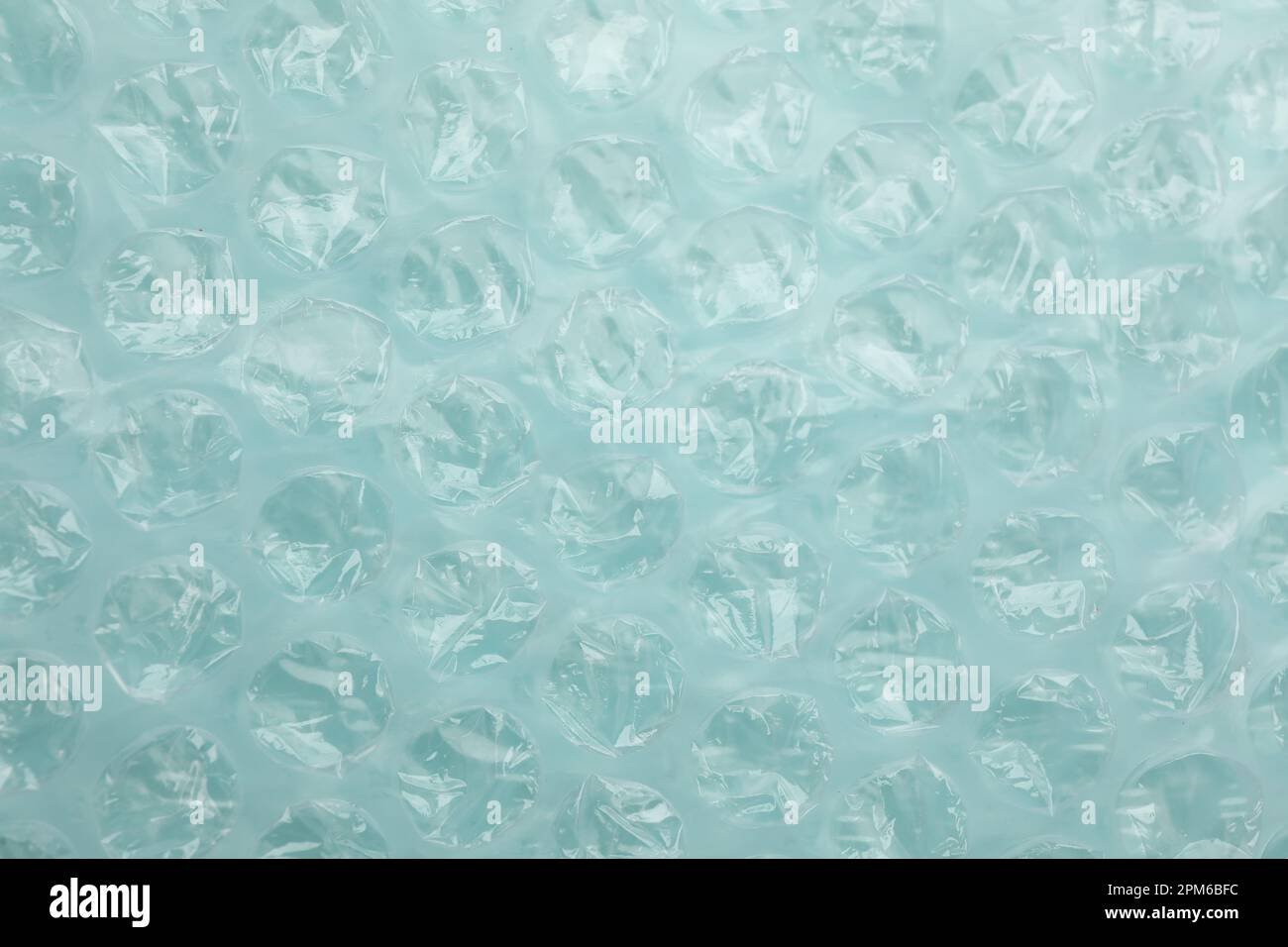 Texture of bubble wrap as background, top view Stock Photo