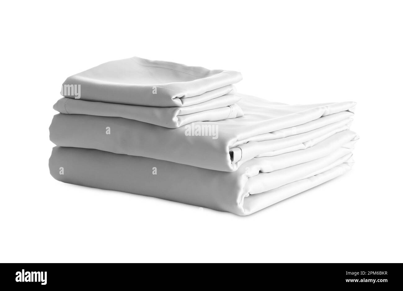 Stack of clean silky bed linen isolated on white Stock Photo Alamy