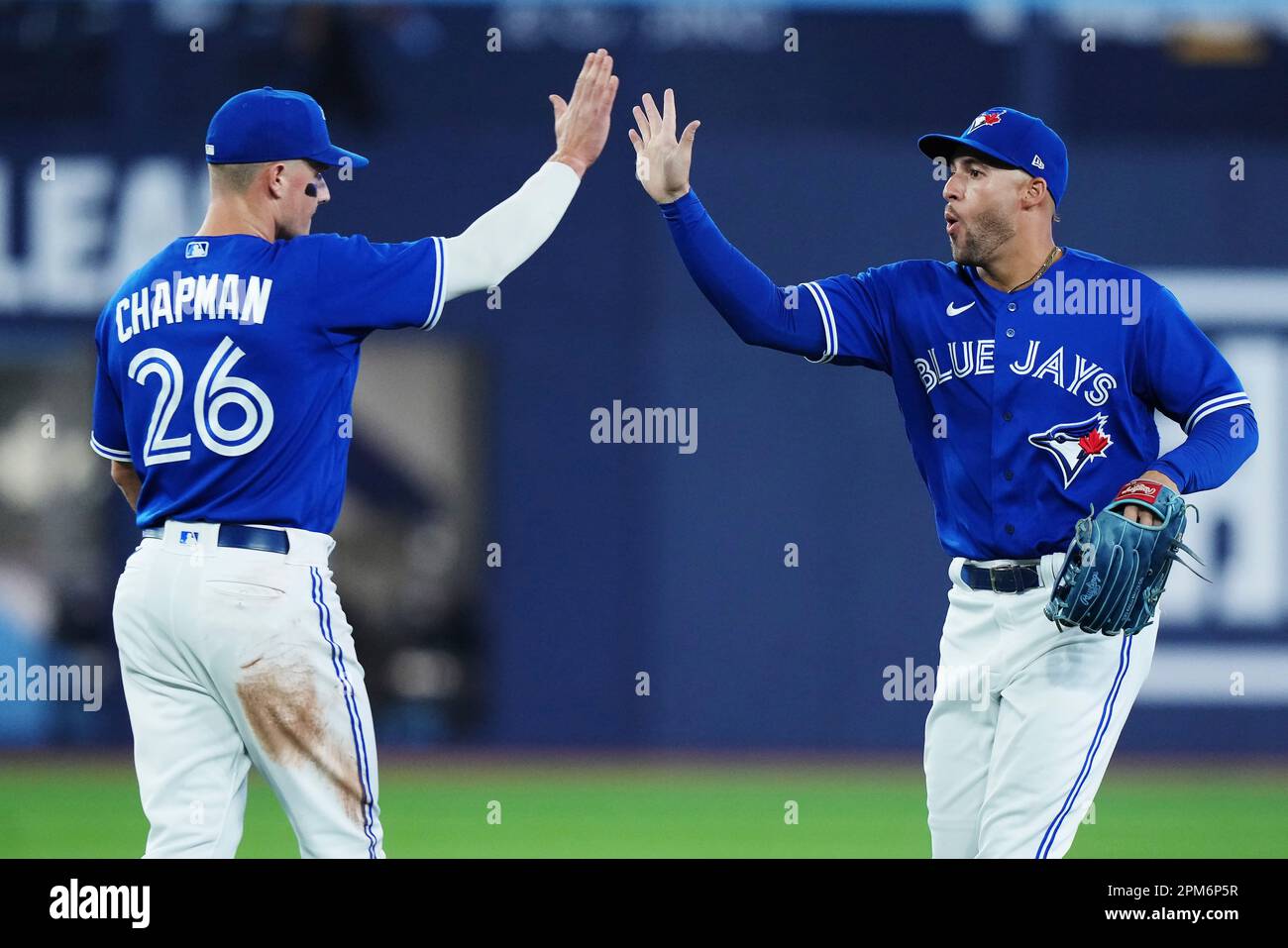 Toronto Blue Jays third baseman Matt Chapman (26) and right fielder Springer (4