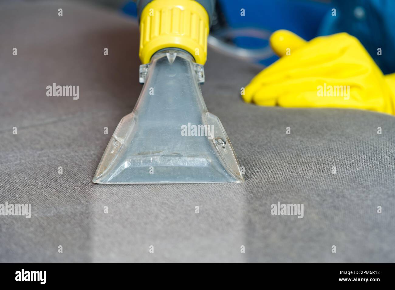 Sofa before and after wet cleaning indoors. textile sofa vacuum