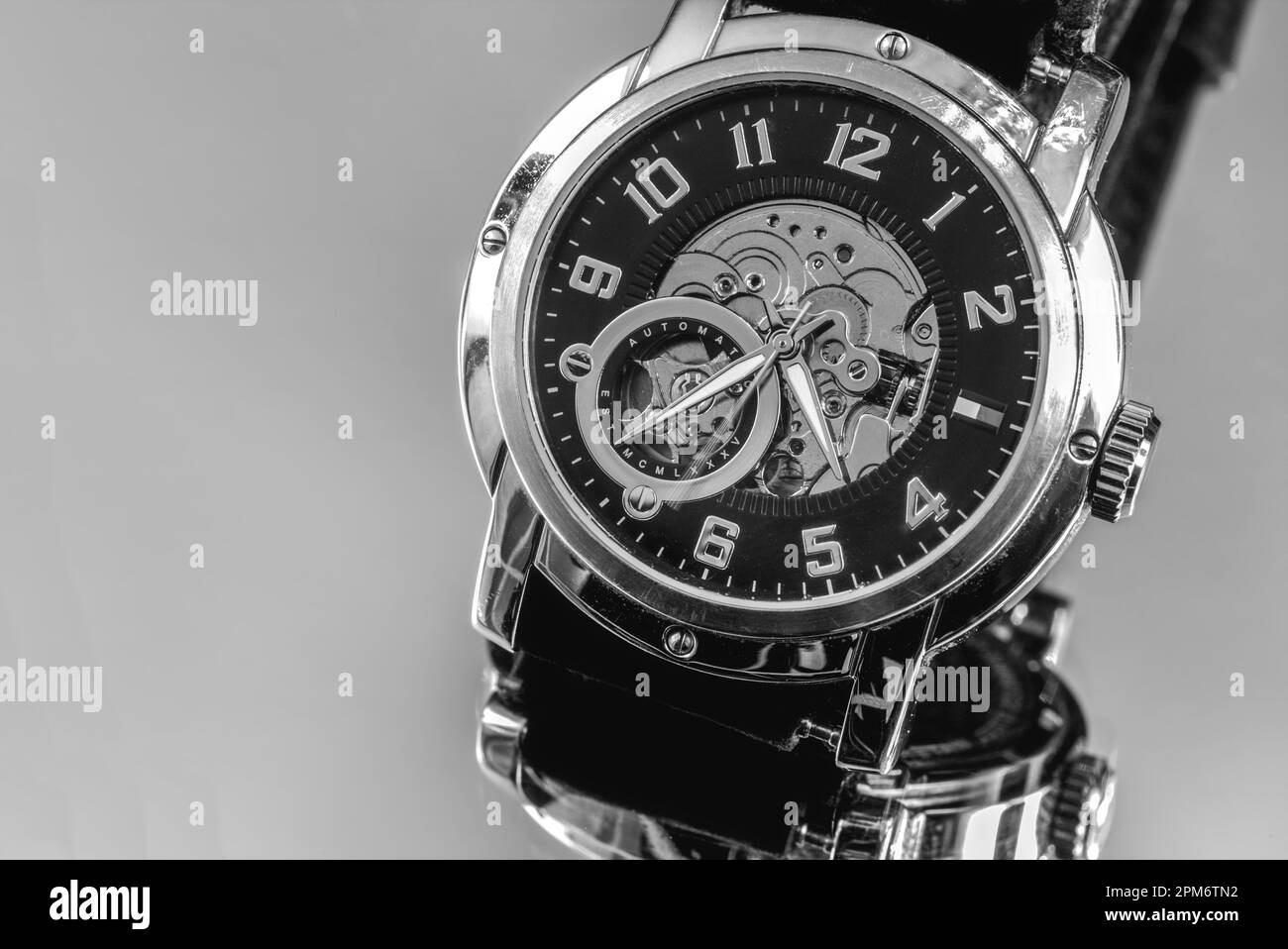 An eighttenths of a second shot captures the moving second hand over