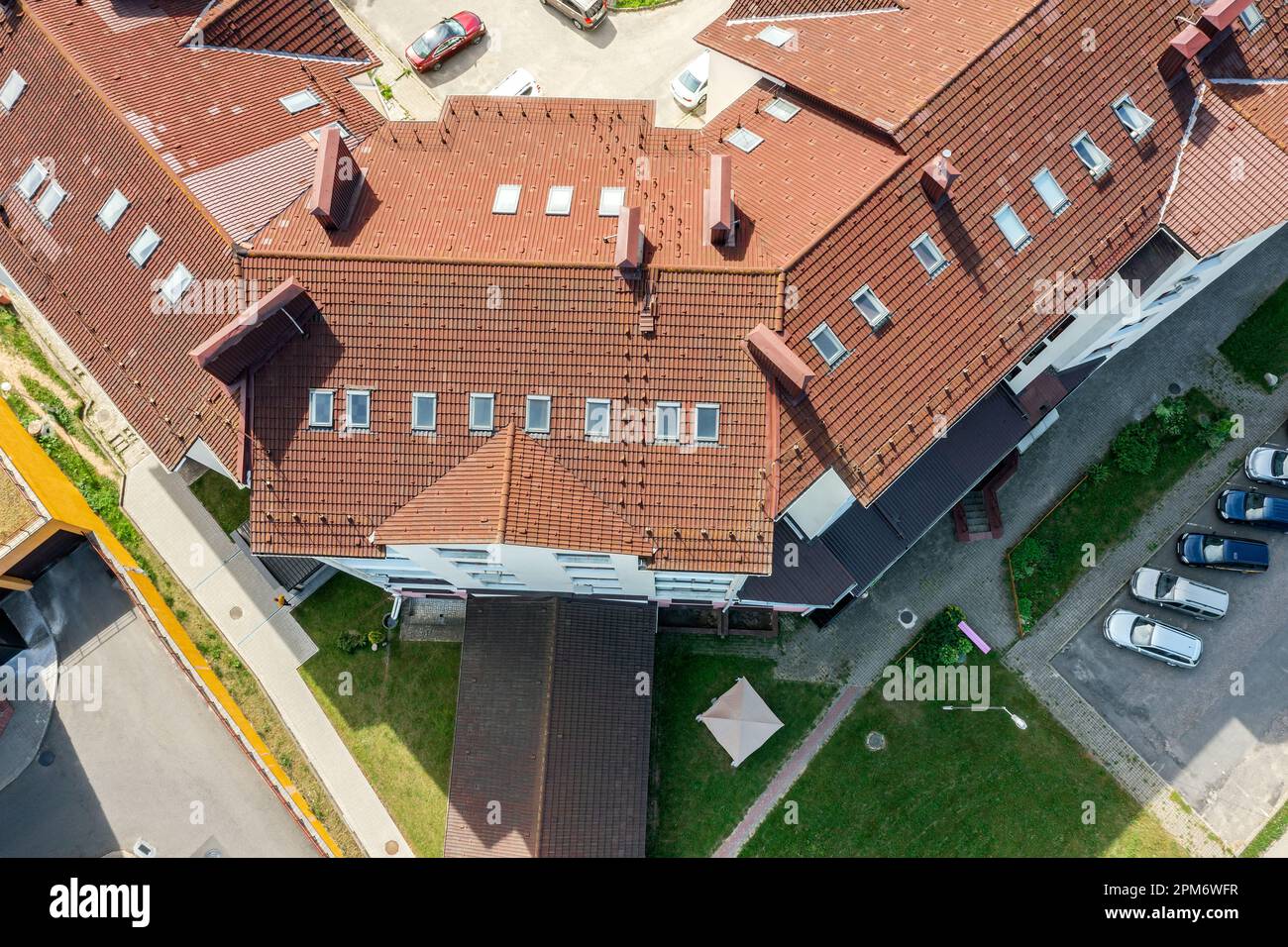 house with red tiled roof on bright sunny day. modern architecture. aerial top view. Stock Photo