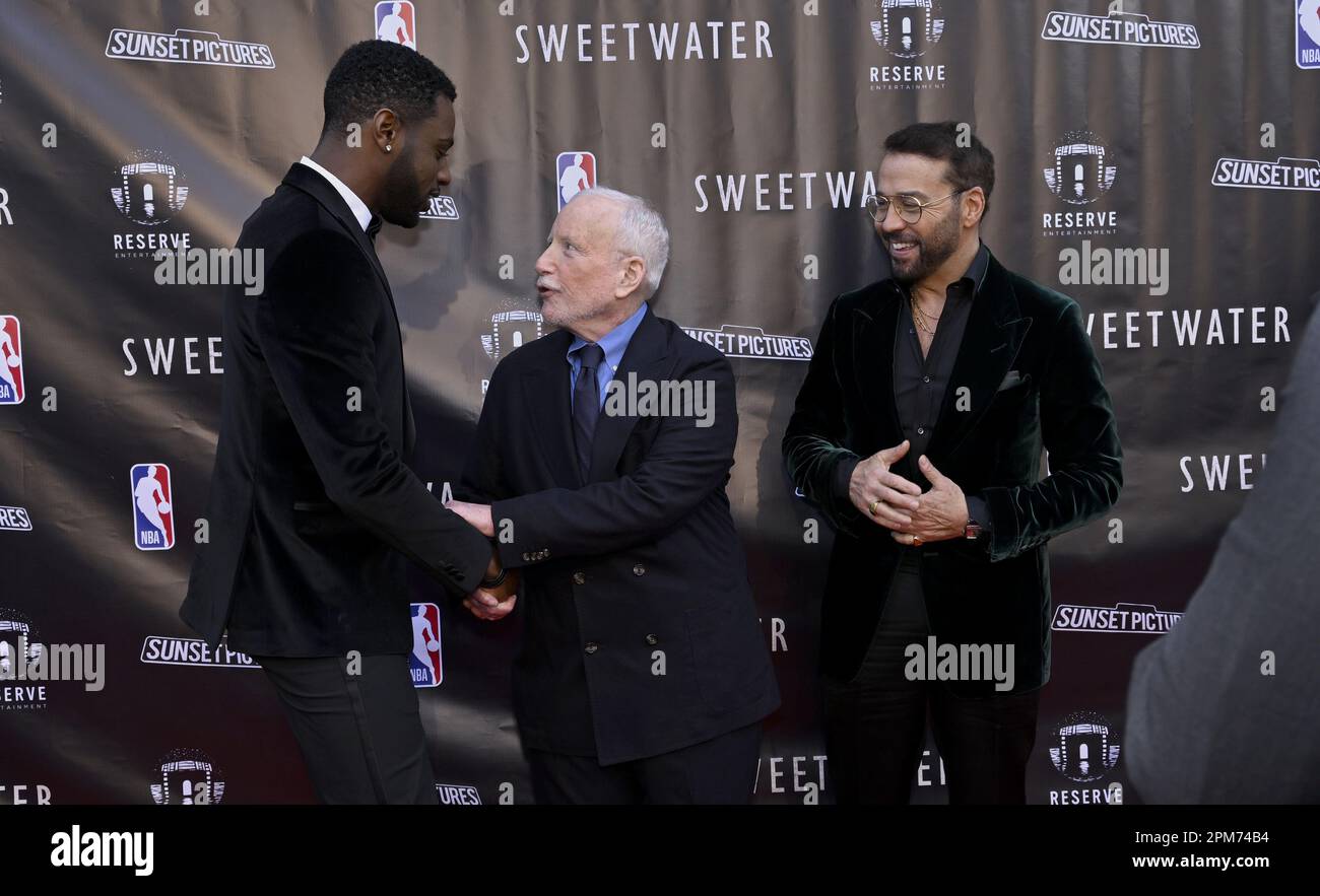 Richard Dreyfuss, center, greets Everett Osborne with Jeremy Piven, right, as they attend the premiere of the biographical sports drama 'Sweetwater' at the Stephen J. Ross Theater, Warner Bros. Studio in Burbank, California on Tuesday, April 11, 2023. Storyline: Hall of Famer Nat 'Sweetwater' Clifton makes history as the first African American to sign an NBA contract, forever changing how the game of basketball is played. After decades of failed attempts, in 2014 Sweetwater Clifton was finally inducted into the Basketball Hall of Fame. Photo by Alex Gallardo/UPI Stock Photo