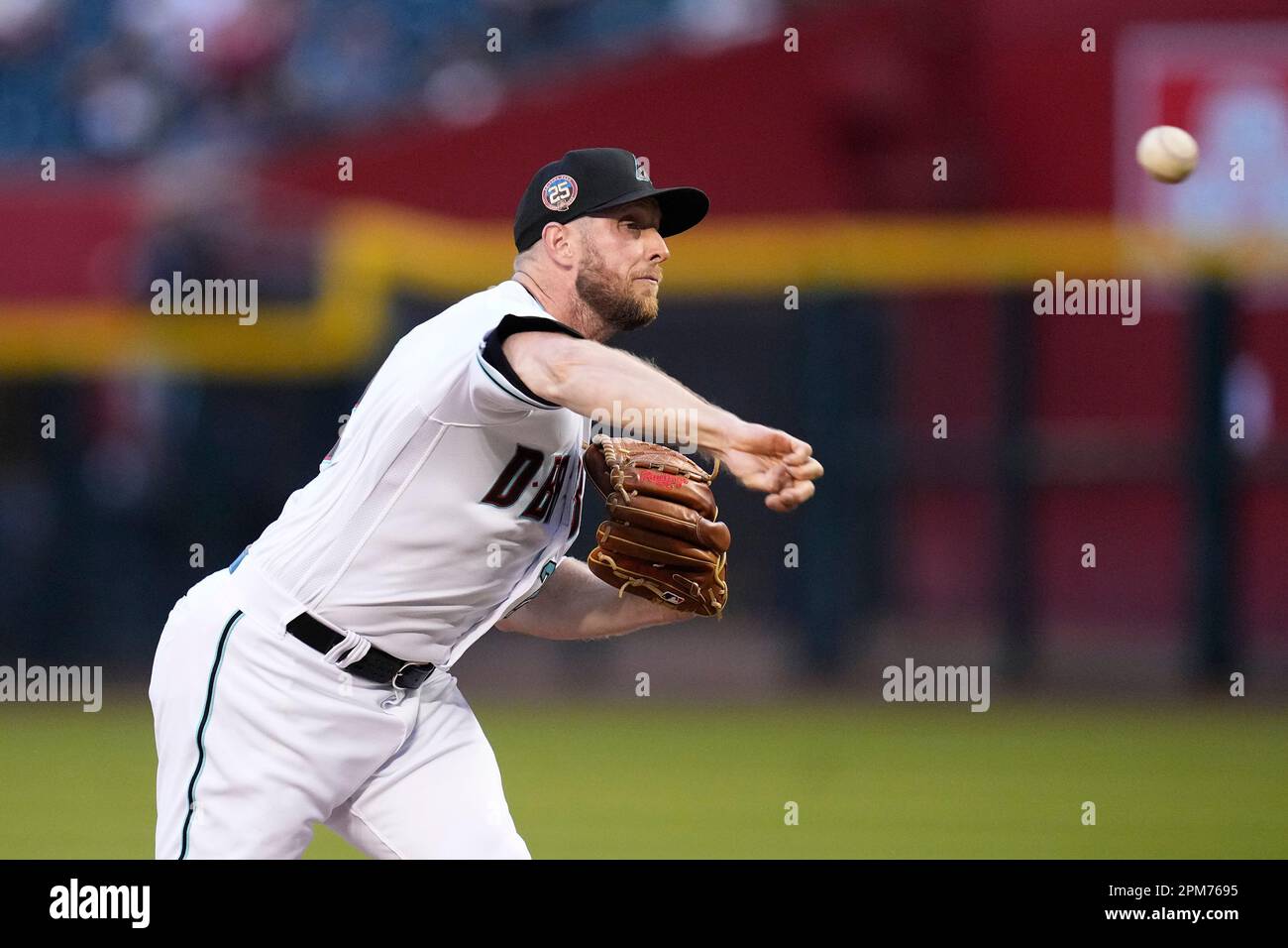 Arizona Diamondbacks starting pitcher Merrill Kelly throws against the