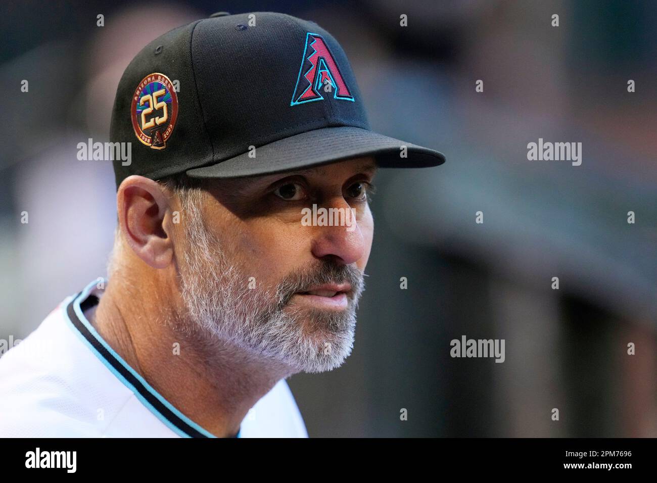 Arizona Diamondbacks manager Torey Lovullo pauses in the dugout prior