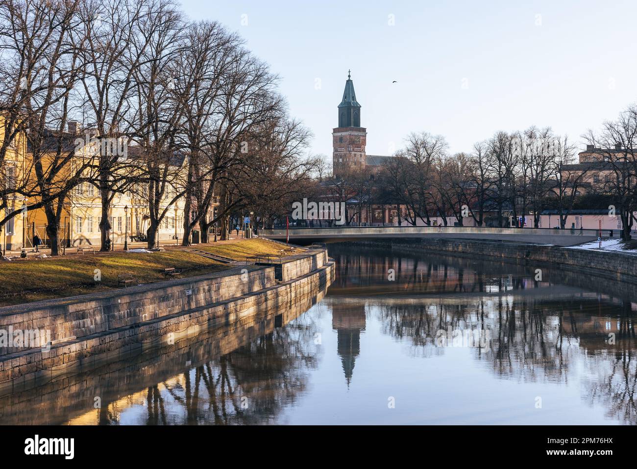Aurajoki river and the Cathedral of Turku, Finland in spring during golden hour in the morning. Stock Photo