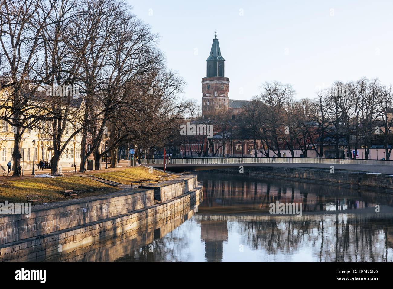 Turku Cathedral and Aura river in Turku, Finland in spring during golden hour in the morning. Stock Photo