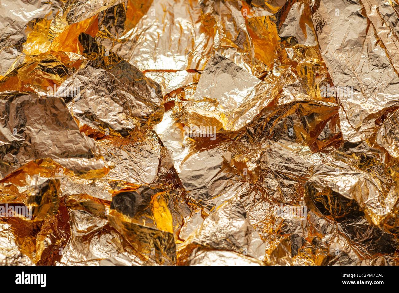 Gold leaf flakes. Luxurious lightweight foil pieces for festive