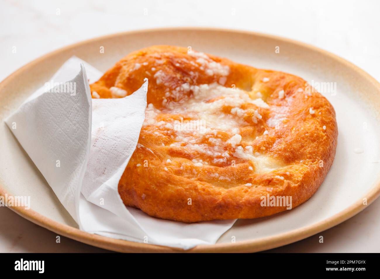 Hungarian typical food called langos Stock Photo - Alamy