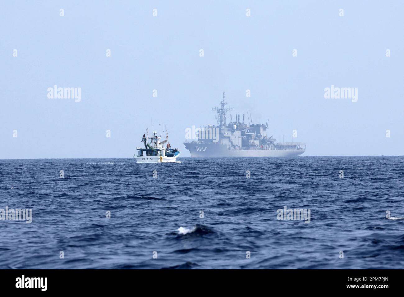 JS Chihaya (background), a submarine rescue ship of Japan Maritime Self ...