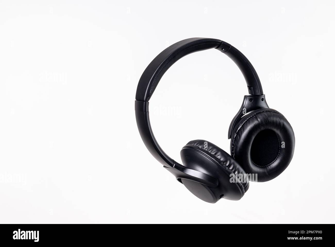 The black headphones isolated on a white background Stock Photo - Alamy
