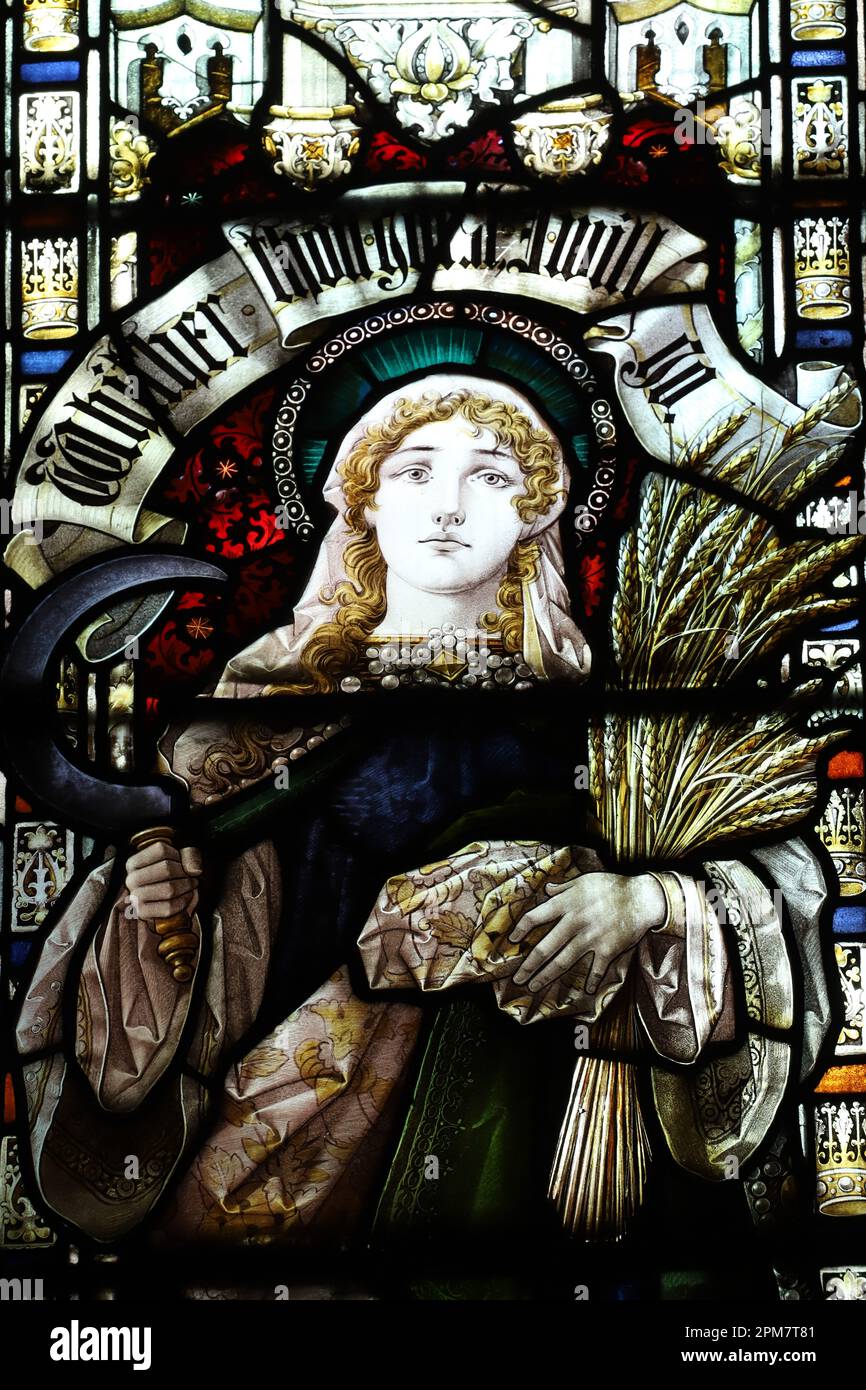 Stained glass window by Percy Bacon & Brothers depicting Ruth, St Mary's Church, Woller, Northumberland Stock Photo