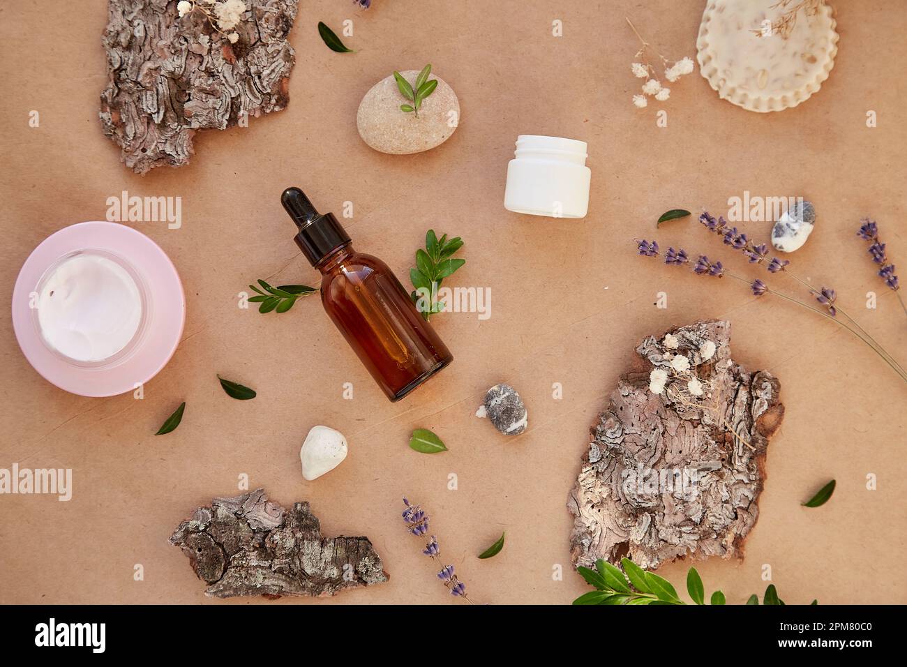Dropper serum glass bottle of hyaluronic acid, mucin cream, natural oat soap. Natural beauty treatments Stock Photo