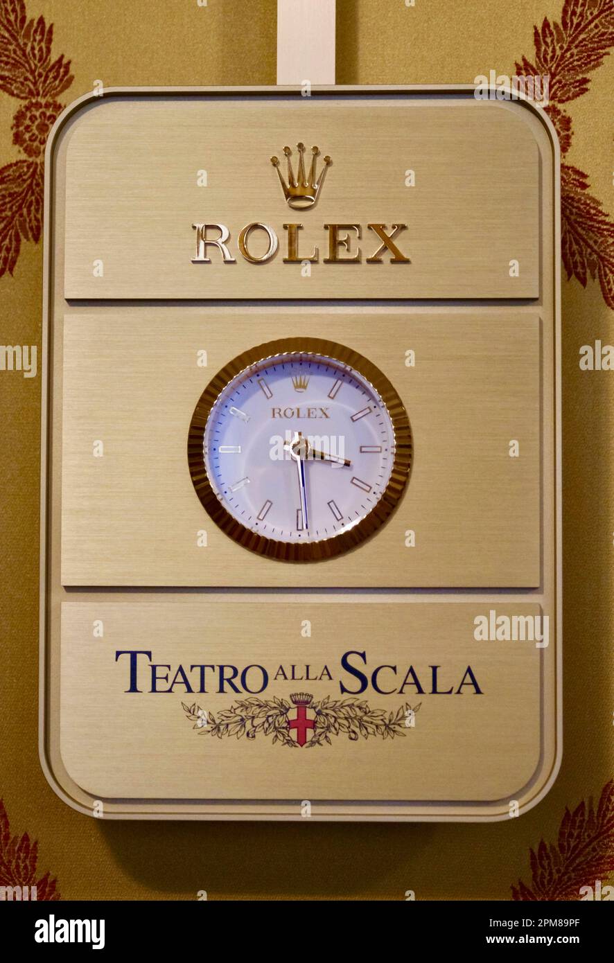 Italy, Lombardy, Milan, Piazza della Scala, museum of the Italian opera theater La Scala inaugurated in 1778 and designed by architect Giuseppe Piermarini, Rolex clock Stock Photo