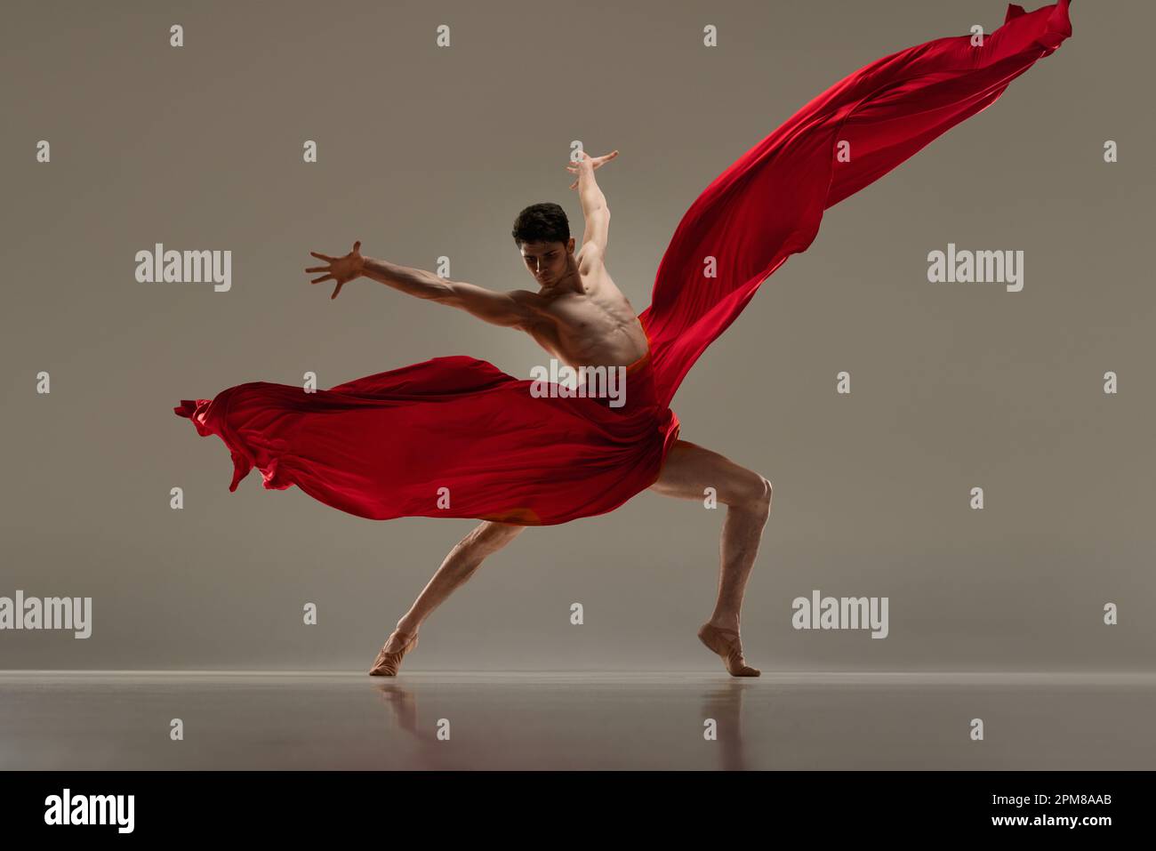 Classic and modern ballet combination. Handsome young male dancer