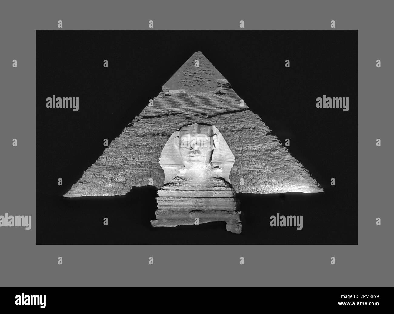 Egypt, Cairo. Gizeh or Giza. Sphinx in front of pyramid of Chephren. Sound and Light Show. Unesco, World Heritage Site. Black & White image. Stock Photo