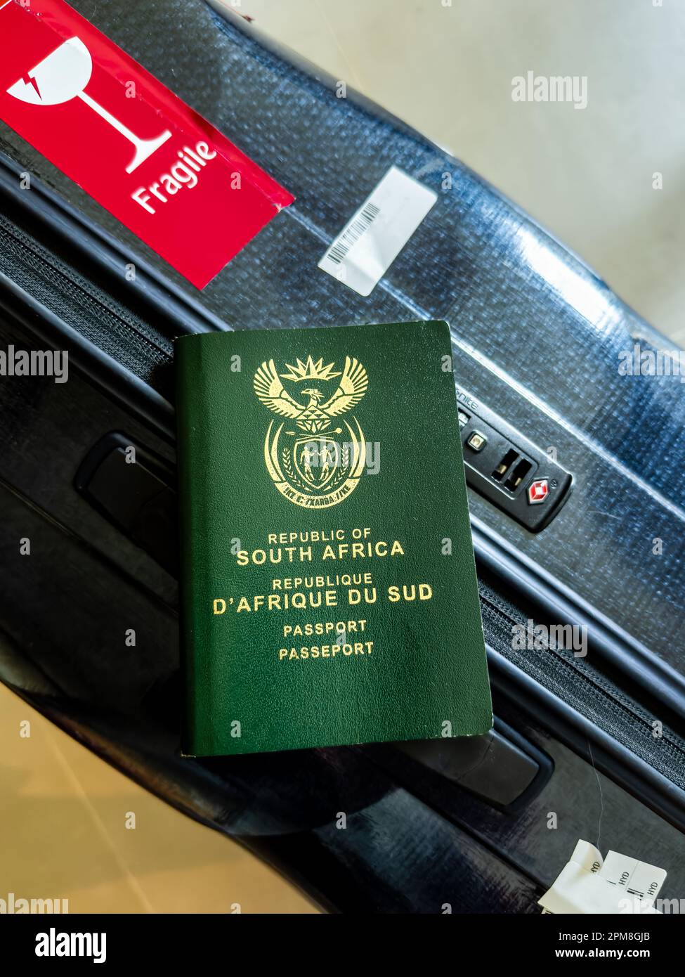 South African passport with luggage and tags Stock Photo Alamy