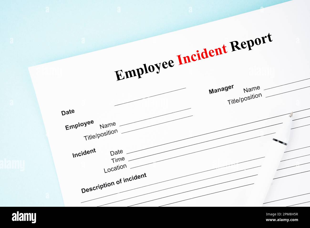 Template Of An Employee Incident Report Form Document And And Pen On template-of-an-employee-incident-report-form-document-and-and-pen-on