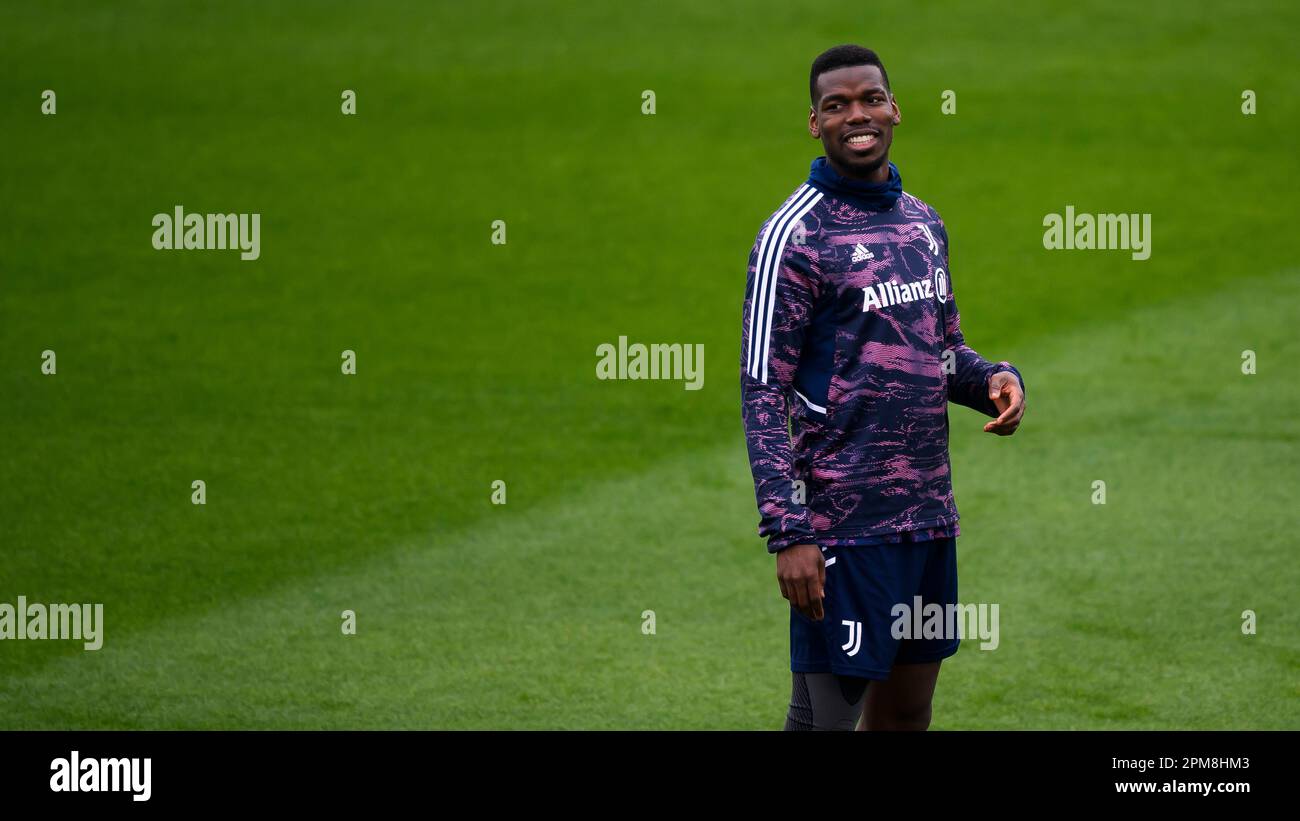 Turin, Italy. 12 April 2023. Paul Pogba of Juventus FC smiles during Juventus FC training on the eve of the UEFA Europa League quarterfinal first leg football match between Juventus FC and Sporting CP. Credit: Nicolò Campo/Alamy Live News Stock Photo