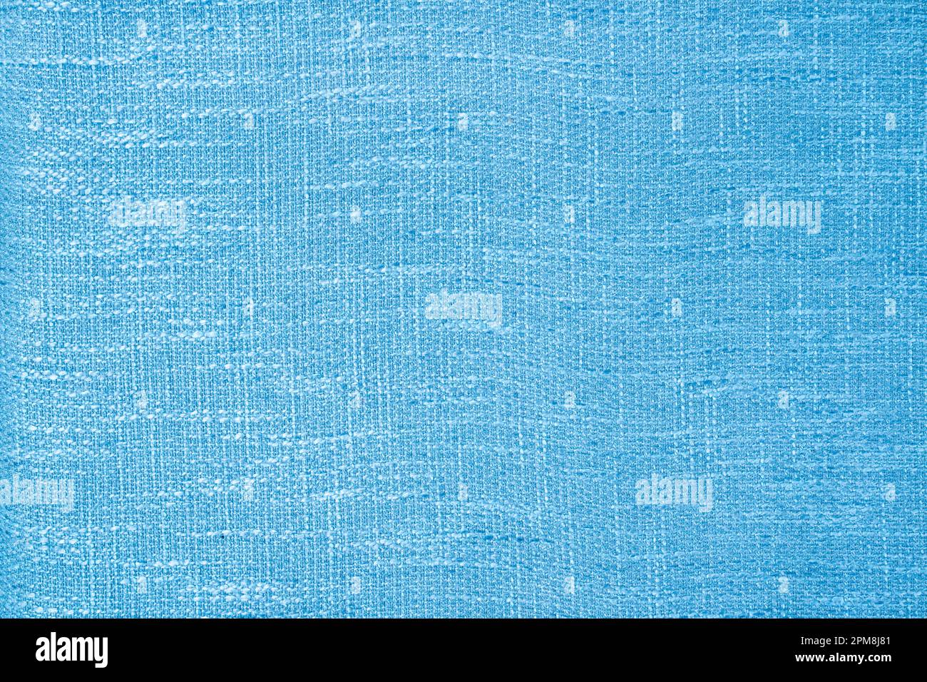 Close up shot of colored light blue fabric texture as background. Stock Photo