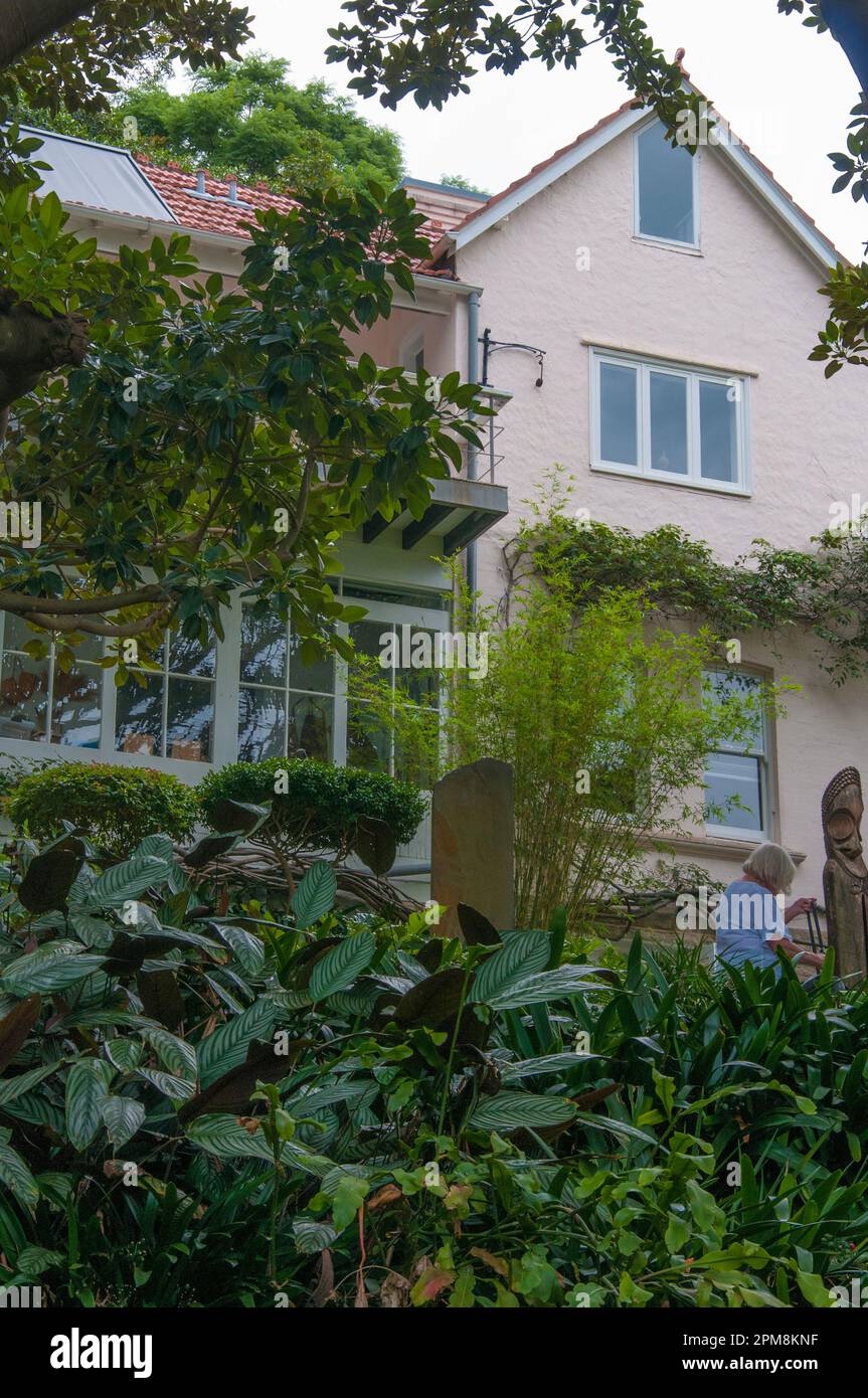 Wendy Whiteley's Garden, created in remembrance of the artist Brett Whitely at Lavender Bay, Sydney, Australia. House above was his studio. Stock Photo