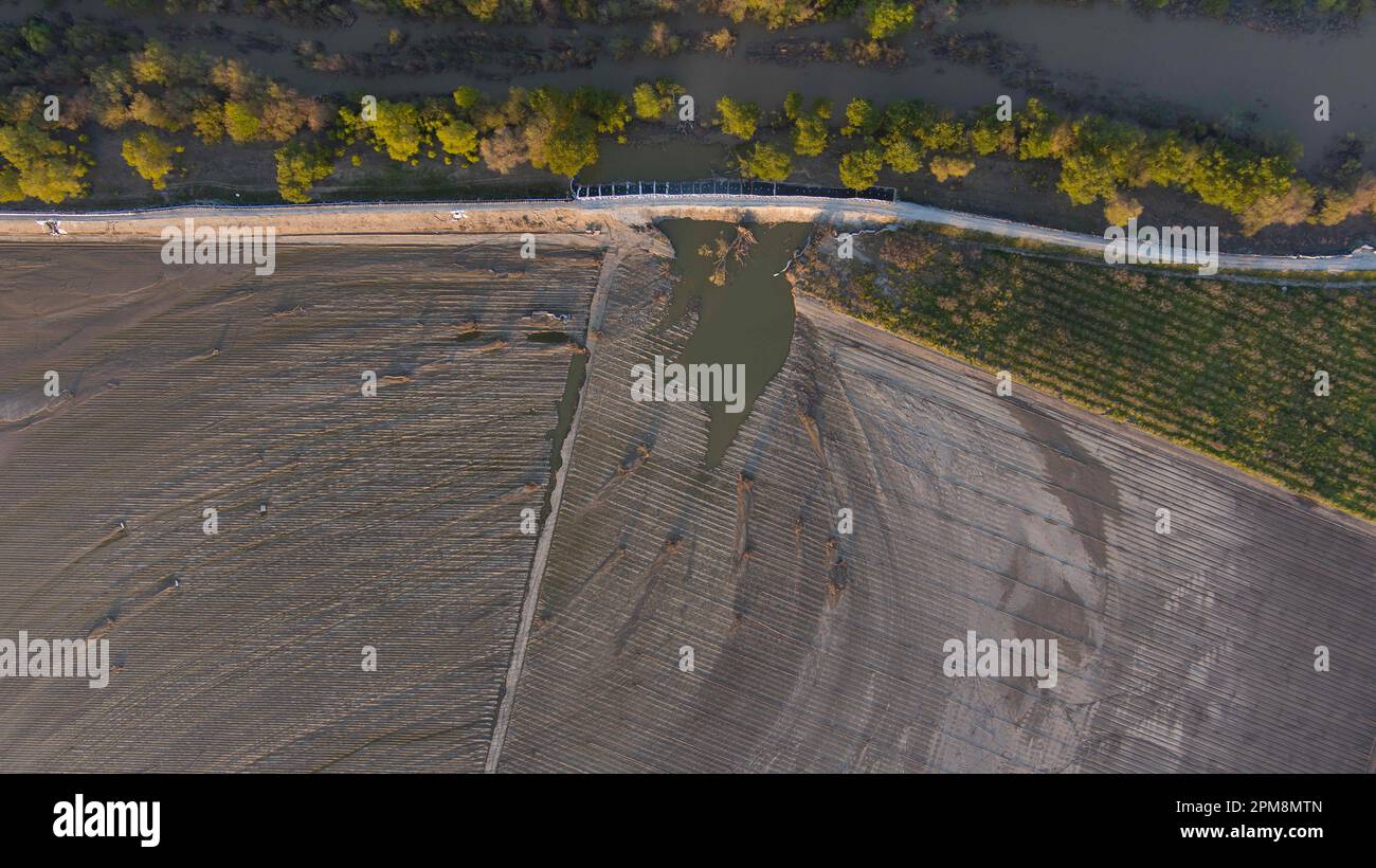 Pajaro, Calif. - March 26: The repaired Pajaro River levee on March 26, 2023. The flood ruined $330,0000 worth of strawberry and Raspberry crops. (Photo by Paul Kuroda for The Washington Post)s. Paul Kuroda/Alamy Stock Photo Stock Photo