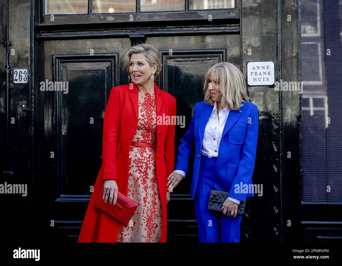 Amsterdam, Netherlands. 12th April, 2023. AMSTERDAM - The French first lady Brigitte Macron (r) and Queen Maxima visit the Anne Frank House. The French presidential couple is paying a two-day state visit to the Netherlands. ANP POOL ROBIN VAN LONKHUIJSEN netherlands out - belgium out Credit: ANP/Alamy Live News Credit: ANP/Alamy Live News Stock Photo