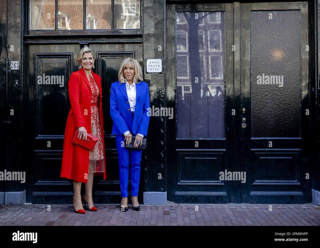 Amsterdam, Netherlands. 12th April, 2023. AMSTERDAM - The French first lady Brigitte Macron (r) and Queen Maxima visit the Anne Frank House. The French presidential couple is paying a two-day state visit to the Netherlands. ANP POOL ROBIN VAN LONKHUIJSEN netherlands out - belgium out Credit: ANP/Alamy Live News Credit: ANP/Alamy Live News Stock Photo