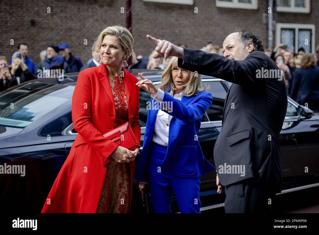 Amsterdam, Netherlands. 12th April, 2023. AMSTERDAM - The French first lady Brigitte Macron (m) and Queen Maxima visit the Anne Frank House. The French presidential couple is paying a two-day state visit to the Netherlands. ANP POOL ROBIN VAN LONKHUIJSEN netherlands out - belgium out Credit: ANP/Alamy Live News Credit: ANP/Alamy Live News Stock Photo