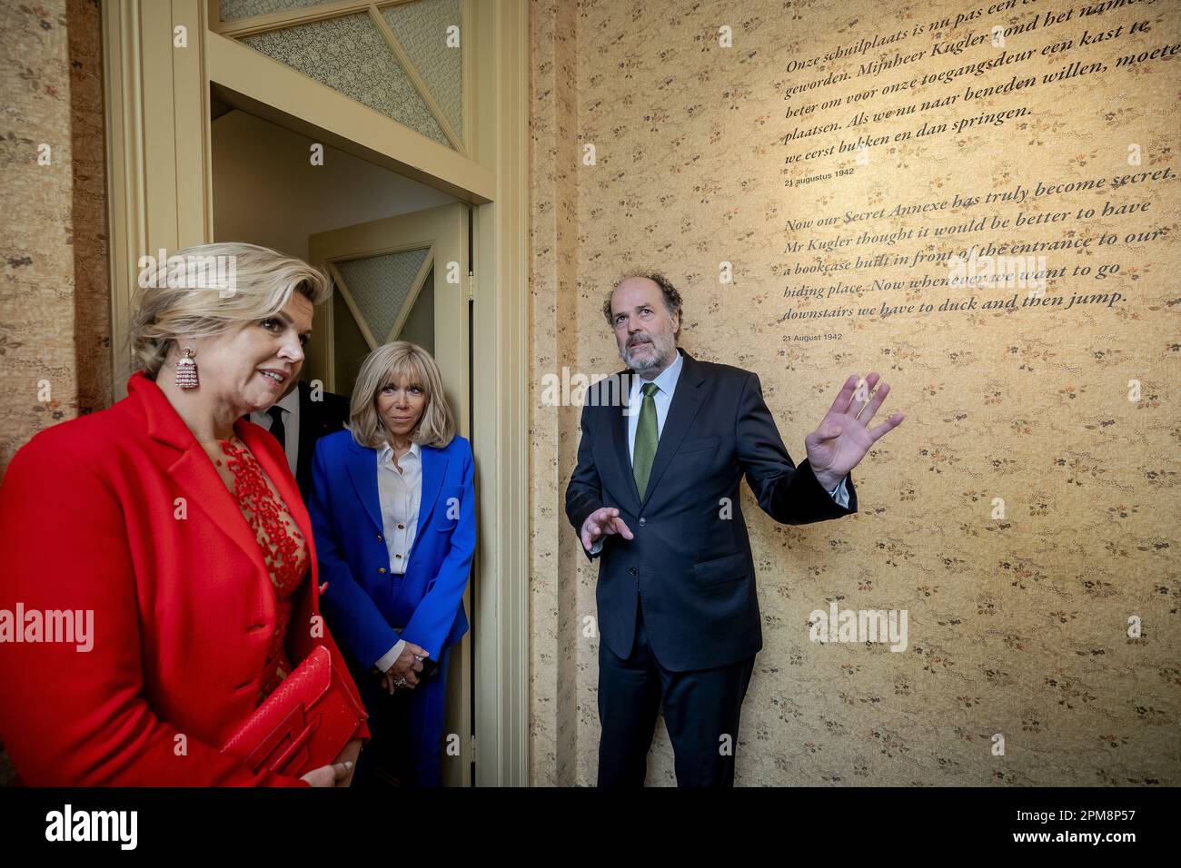 Amsterdam, Netherlands. 12th April, 2023. AMSTERDAM - The French first lady Brigitte Macron (m) and Queen Maxima visit the Anne Frank House. The French presidential couple is paying a two-day state visit to the Netherlands. ANP POOL ROBIN VAN LONKHUIJSEN netherlands out - belgium out Credit: ANP/Alamy Live News Credit: ANP/Alamy Live News Stock Photo