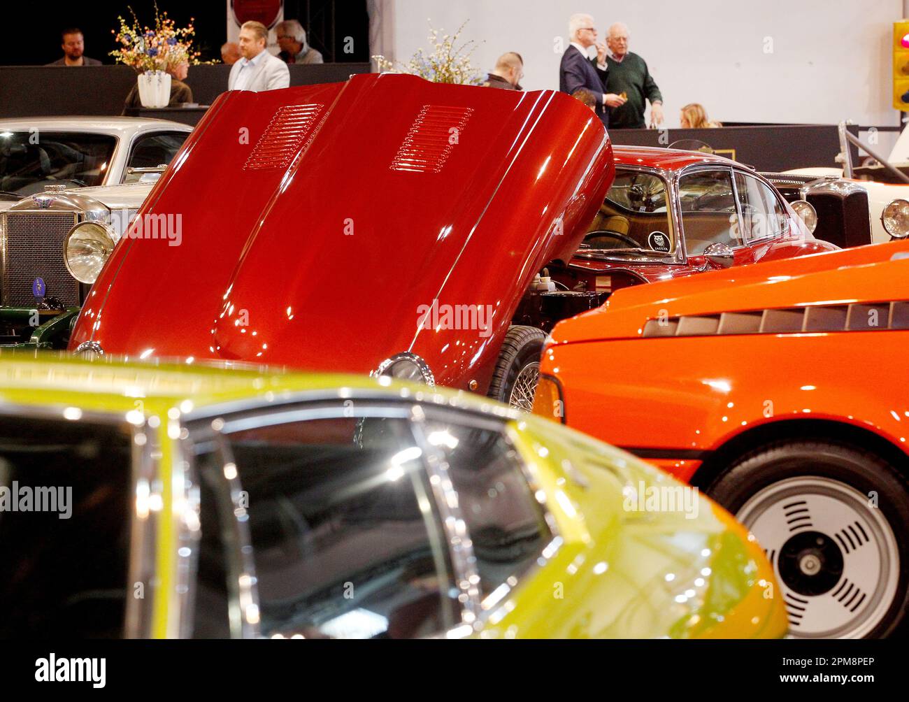 Essen, Germany. 12th Apr, 2023. A Jaguar EType and other classic cars