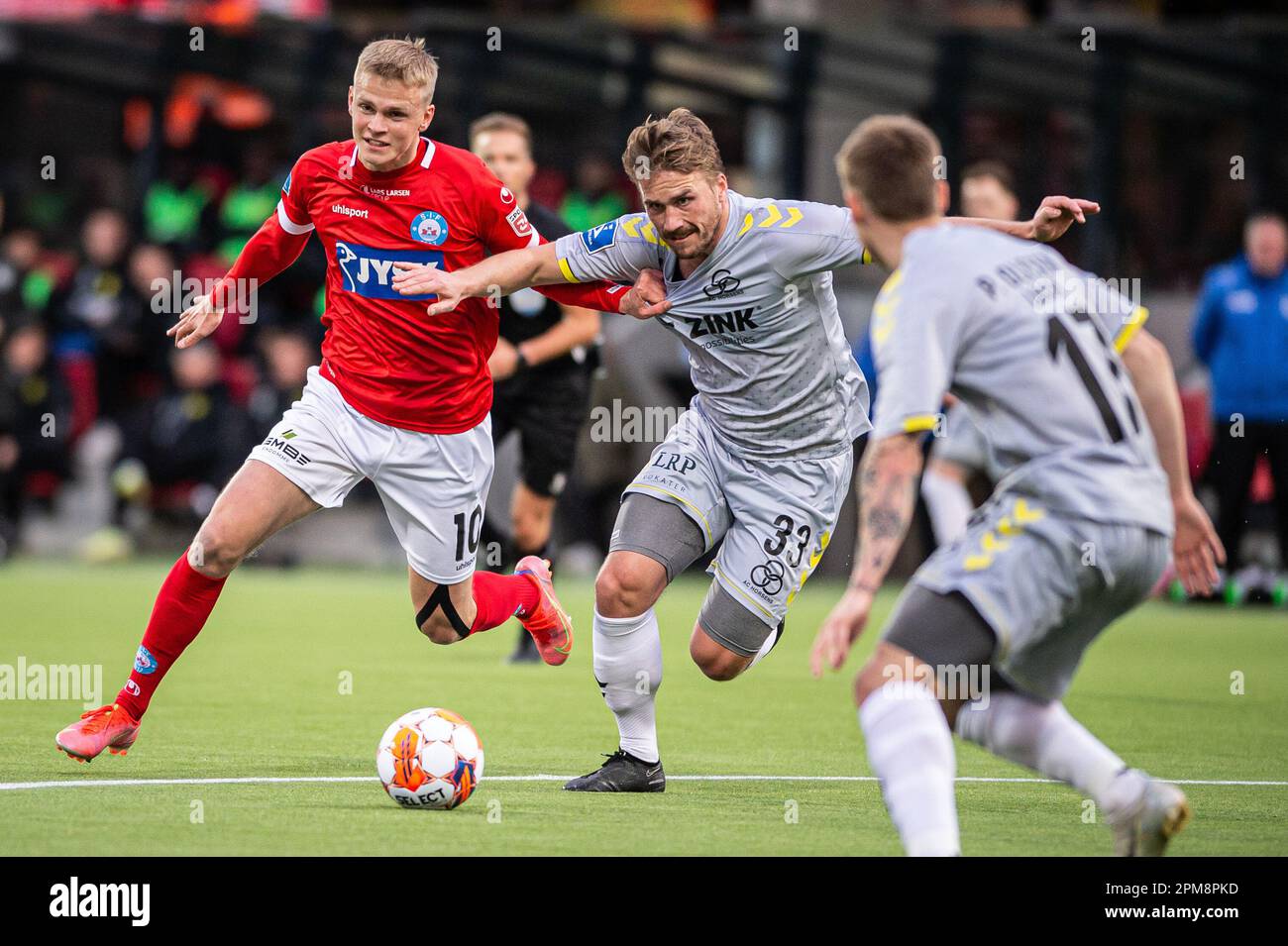 Silkeborg, Denmark. 11th Apr, 2023. Soren Tengstedt (10) of Silkeborg IF  and Alexander Ludwig (33) of of AC Horsens seen during the 3F Superliga  match between Silkeborg IF and AC Horsens at