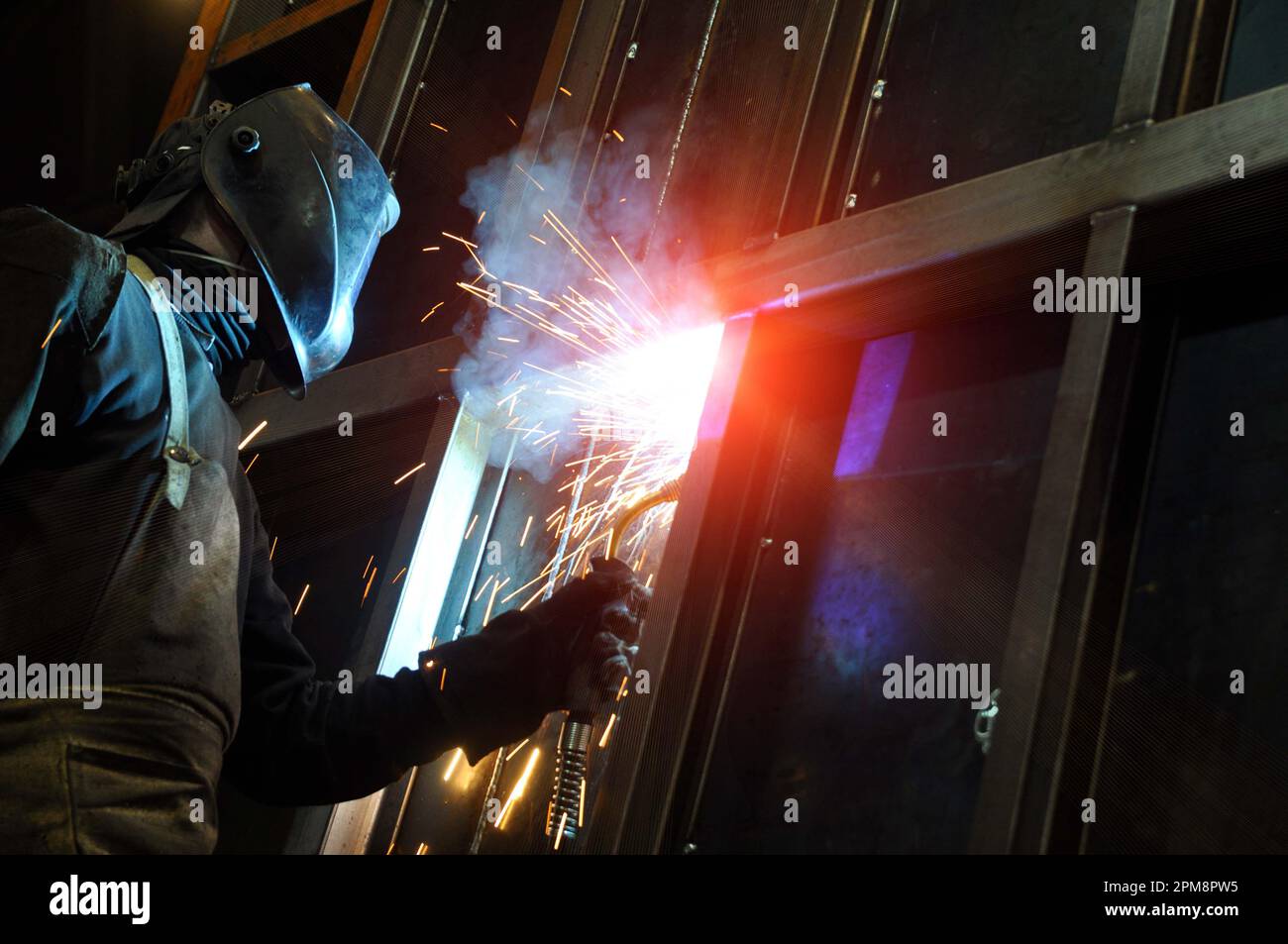 The process of welding a vertical joint in a product Stock Photo Alamy
