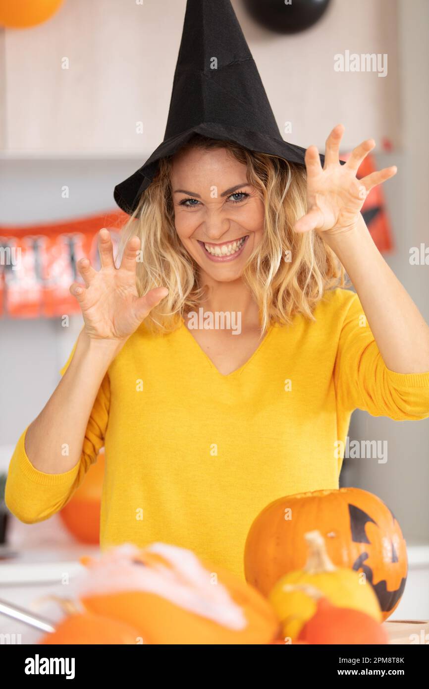 beautiful screaming woman in witch halloween costume Stock Photo Alamy