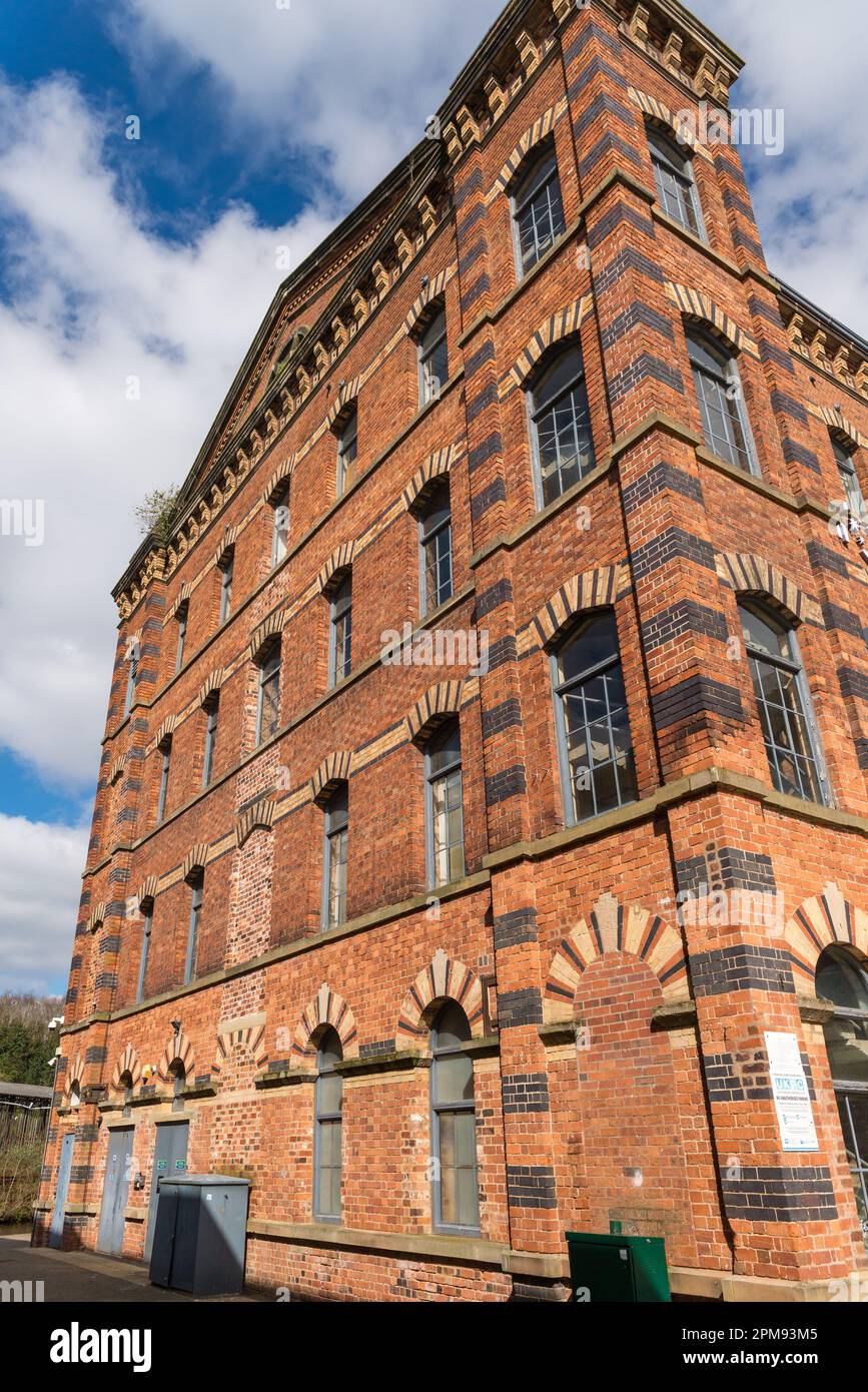 Old carpet factories have been converted into shops on a retail park at