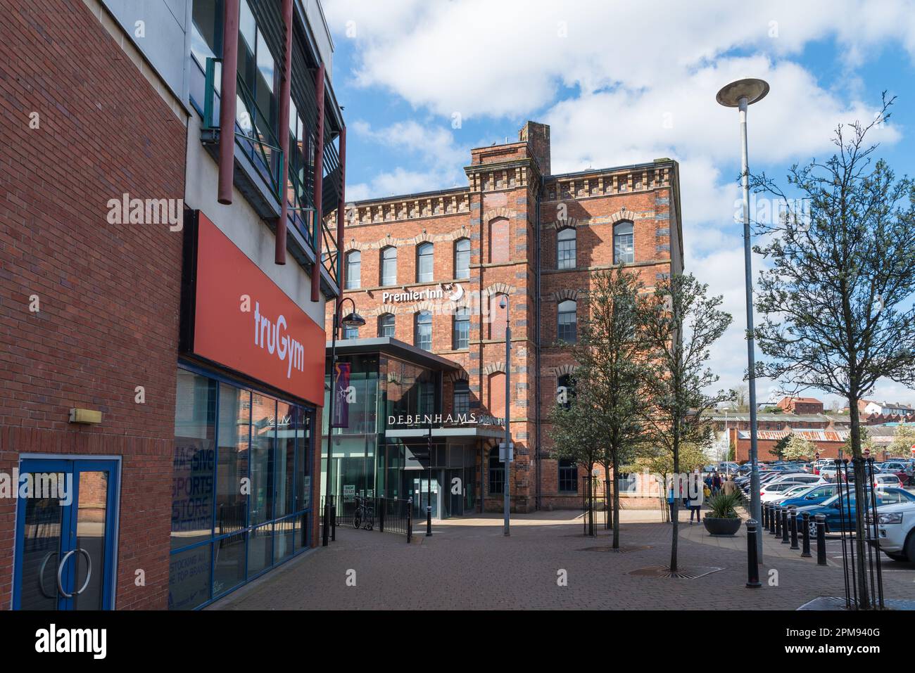 Old carpet factories have been converted into shops on a retail park at