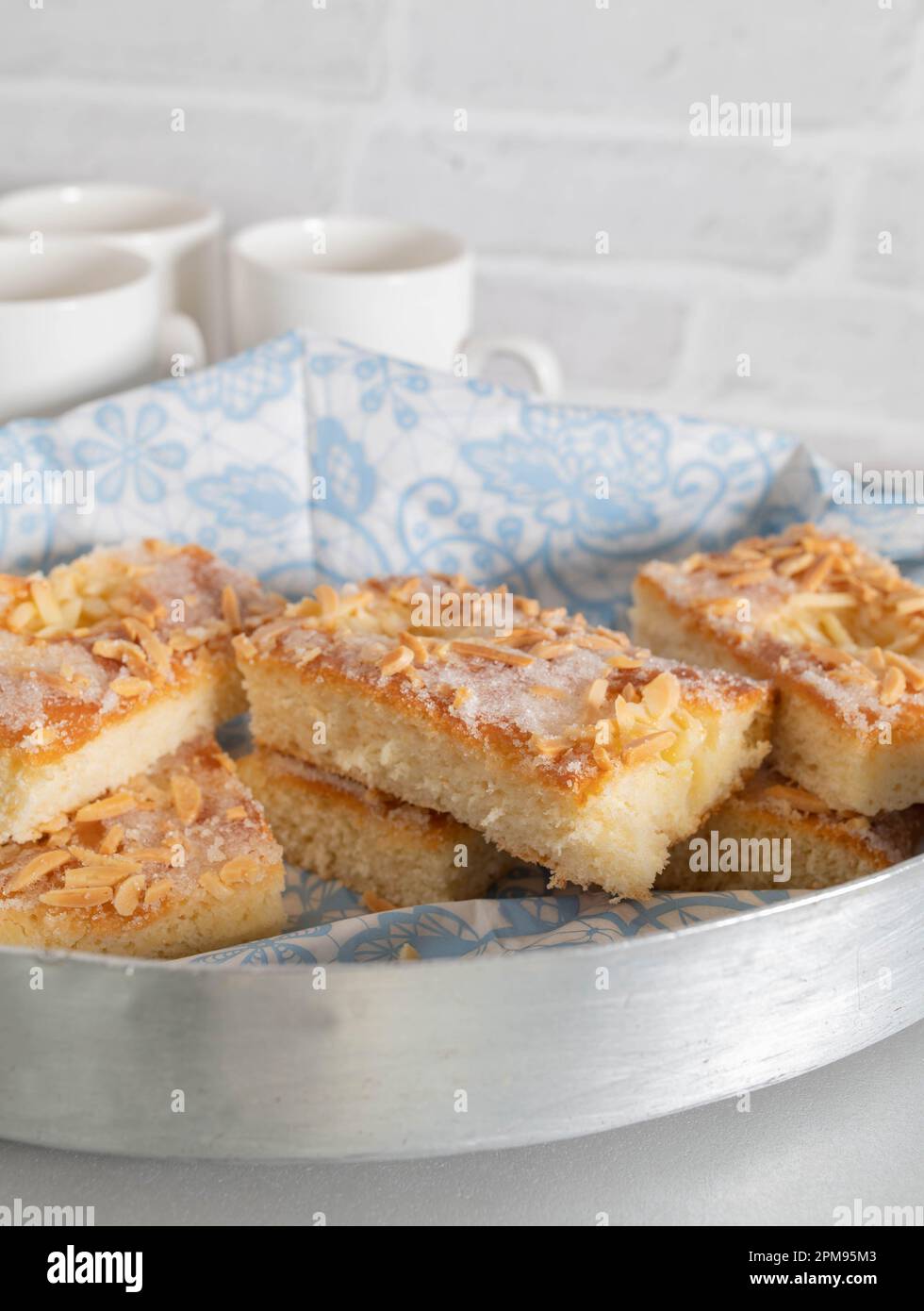 Fresh baked butter almond cake. Traditional german yeast cake Stock Photo