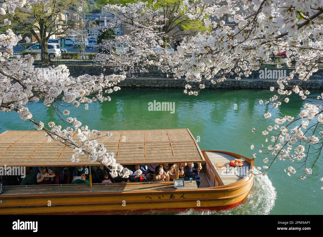 Kyoto, Japan March 28, 2023 Tourists boating on the Okazaki canal
