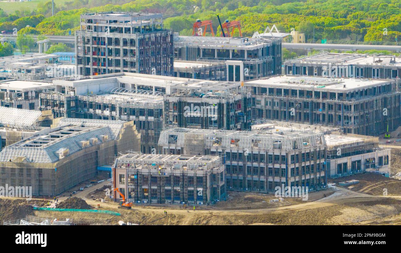 SHANGHAI, CHINA - APRIL 12, 2023 - Builders, along with hundreds of ...