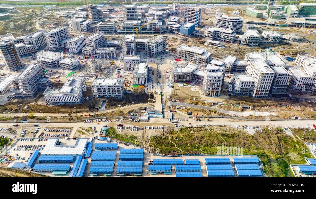 SHANGHAI, CHINA - APRIL 12, 2023 - Builders, along with hundreds of ...