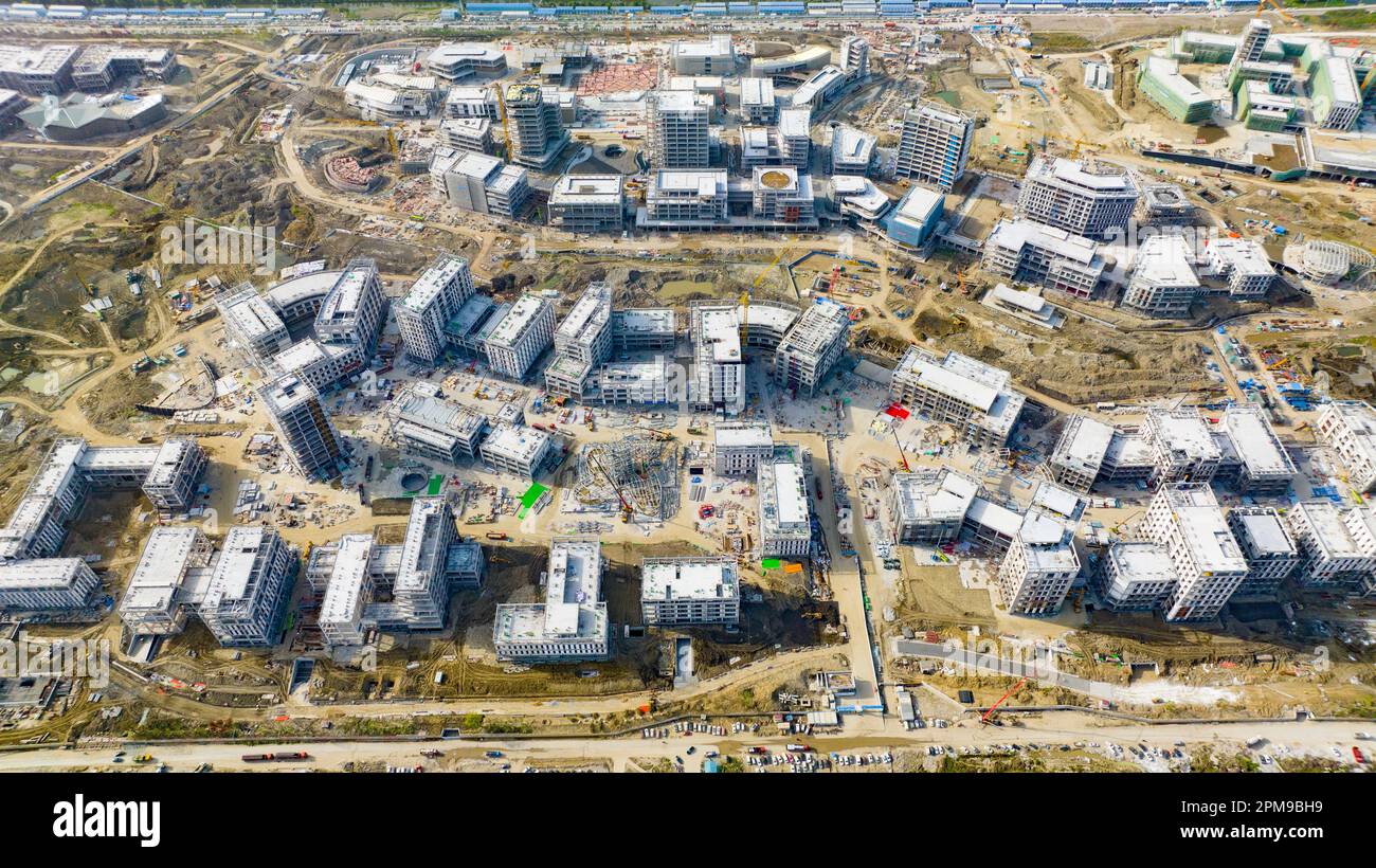 SHANGHAI, CHINA - APRIL 12, 2023 - Builders, along with hundreds of ...