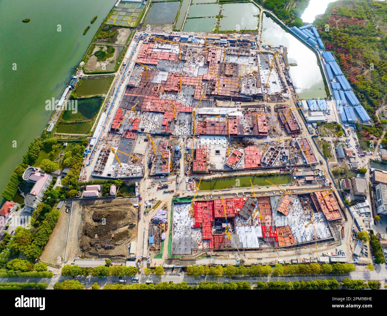 SHANGHAI, CHINA - APRIL 12, 2023 - Builders, along with hundreds of ...