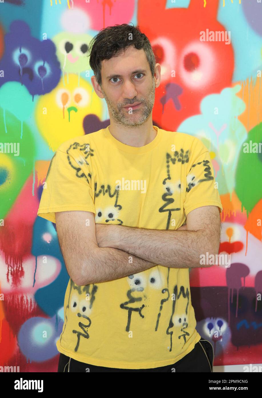 London, UK. British born artist Jon Burgerman poses with his painting ...